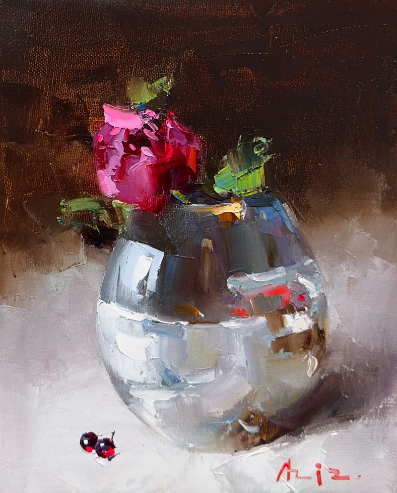 Rosebud in a silver vase